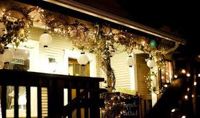 Grapevines And White Lights Oriental Lanterns Are A Nice Touch Beautiful Way To Decorate Grapevine Garland Outdoor Christmas Decorations Christmas Porch