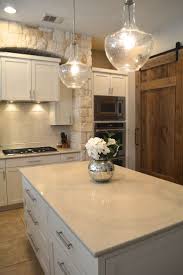 Black And White Speckled Granite Countertops We Replaced The Gold Speckled Granite With A Creamy Caesarstone Called Dreamy Marfil Kitchen Marble Quartz Kitchen Countertops Marble Countertops Kitchen