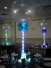 Stunning table centrepieces, foil confetti, photo holders and more. 21st Birthday Party