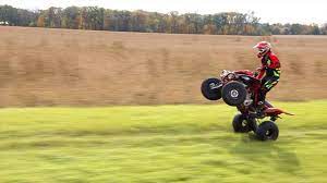 How To Wheelie A Sport Quad Youtube