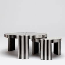 Black And White Striped End Table A Set Of Two Dramatic Nesting Coffee Tables In A Striped Black And White Resin A Clean Round Suface Sits Atop Three Wide Le With Images Nesting Coffee Tables Coffee Table
