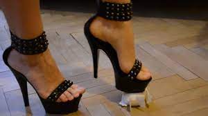Stuffed toy crushed by black heeled sandals - Feet9