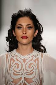 A Model Walks the Runway in a Walter Mendez Design at the Art Hearts  Fashion Show during MBFW Fall 2015 Editorial Photo