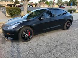 Matte black, gloss black, matte gray, bright white, brush satin, velocity red, imperial red, and diamond black. I Absolutely Love This Car Tesla Model 3 With Xpel Stealth Chrome Delete Gloss Powder Coated Rims Tints And Red Break Calipers Badges Teslamotors