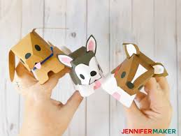 I used brown to cut out an oval for the dogs snout, white for the eyes and pink for his tongue. Make Paper Dog Puppy Boxes So Adorable Jennifer Maker