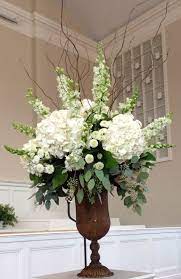 Set your dining table in style with one of our beautiful silk flower centerpieces. Flower Arrangements For Office Receptions Create A Lively Aura Flower Arrangements For Home Floral Arrangements Modern Floral Arrangements Flower Arrangements