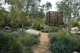 Create an oasis in the front or backyard and eliminate the need for grass by designing a landscape that uses mostly hardscape features, such as a deck, patio, koi pond, water features, an outdoor kitchen or a fire pit. Check Out These Amazing Australian Native Garden Design Ideas