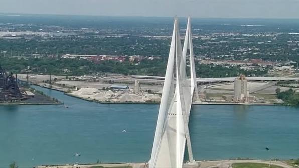 Canada on Friday celebrated the completion of a new bridge to the U.S. over  the Detroit River, cutting a ceremonial ribbon on a multibillion-dollar,  multiyear project that will serve as a critical