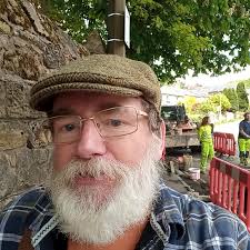 Allan Brame enjoying the sunshine while delivering Focus 273