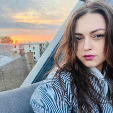 We are arriving in Riga next Friday at 22:55 and staying at the Tribe Hotel  in the City Centre, are we best getting a taxi or Uber, how much is the  average