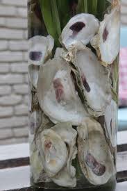 Oyster Hysteria Oyster Shell Flower Arrangement Southern State Of Mind Blog By Heather Oyster Shells Decor Oysters Flower Arrangements