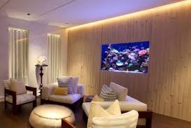 There is nothing more relaxing than sitting and looking into a beautiful home aquarium, it has a way of taking you away from where you are to a nice tropical place. Aquarium Designs In Wall Aquariums Free Standing Tanks