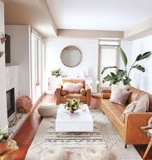 The designers of this bohemian living room let nature supply the main color, primarily via a large houseplant. 8 Amazing Scandinavian And Bohemian Living Room Ideas That Will Steal Your Hearts Daily Dream Decor