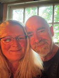 Vans and southern lights at a gathering