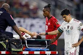 Mexico forward hirving lozano (22) lays injured during the first half of a concacaf gold cup group stage soccer match against the trinidad and tobago at at&t. Gold Cup Mexico S Hirving Lozano Out Of Hospital After Head Neck Injury The Athletic