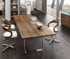 A sculptural base adds visual interest to the area. Walnut Dining Tables Solid Walnut Furniture Wharfside