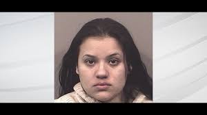 Woman arrested for auto theft in connection with Greenwood fatal shooting