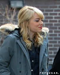 But while the color was a shock, her a+ sartorial game was not: Emma Stone In Nyc For The Amazing Spider Man 2 Emma Stone Smiles Big On Set While Andrew Garfield Packs Up Popsugar Celebrity Photo 15