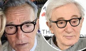 Rock legend Bruce Springsteen looks unrecognisable as he poses with fan