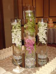 Bohemian reception with neutral linens and tropical greenery centerpieces. Centerpieces By Bride Blossom Nyc S Only Luxury Wedding Florist Wedding Ideas Tips And Trends For The Modern Sophisticated Bride