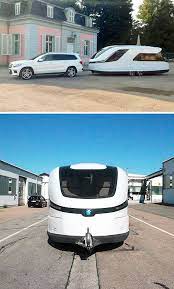 Curvy Cruiser Streamlined Caravan Looks Sleek Inviting Luxury Campers Camping Trailer Recreational Vehicles