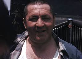 Screen shot from the 1926 Tuscazoar film. Bob Kinser is your grandfather  the Scout bottom row, second from right? It sure looks like him. This would  be 1926 or 27.