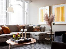 Before buying any styling products or decorating your coffee table, consider the scale of the table and your living room as a whole. How To Style Round Coffee Tables 3 Brabbu Design Forces