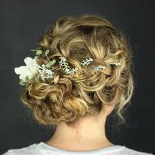 We love the asymmetry of this style. 20 Soft And Sweet Wedding Hairstyles For Curly Hair 2020