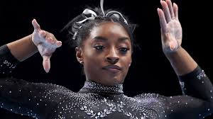 Simone Biles: Olympic champion responds to viral video of black girl not  given medal
