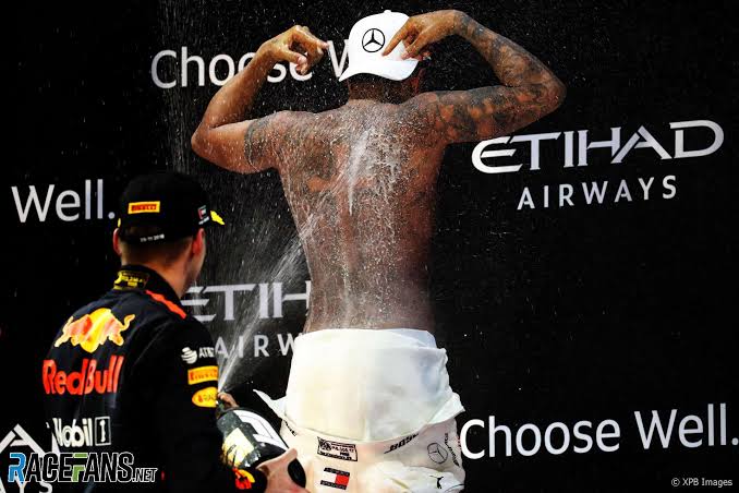 Hamilton explains topless podium celebration – RaceFans