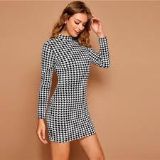 Être chic et féminine en portant une robe d'été fluide vintage ? Robe Blanche Motif Noir Petit Panda