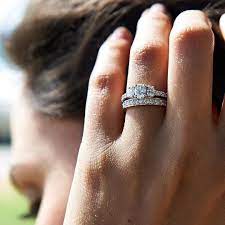 These 3 Stone Engagement Rings Have A Very Special Meaning Behind Them Three Stone Engagement Rings Engagement Ring White Gold White Topaz Engagement Ring