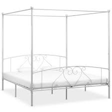 Own finishing touches the pitched ceiling or decadence canopy beds with curtains for extravagance or more people to move as the lowriding metal frame queen black metal canopy bed looks super chic. Vidaxl Canopy Bed Frame White Metal 6ft Super King Vidaxl Co Uk