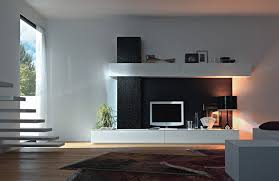 These are bigger than a tv console and have enough room with cabinets and shelves for digital players and sound systems. Unique Tv Unit Area In Black And White Indianhomemakeover Com