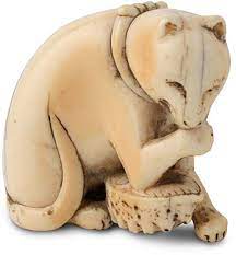 Check out our cat netsuke selection for the very best in unique or custom, handmade pieces from our figurines & knick knacks shops. Japanese Art Netsuke Cat On Awabi Shell