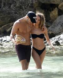 And megan mckenna still appeared to be on a romantic high during her appearance on monday's lorraine as she gushed about her new beau and dismissed his 'muggy' nickname. Bikini Clad Megan Mckenna Cosies Up To Muggy Mike Thalassitis Daily Mail Online