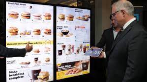 A picture of scott morrison during the virtual apec summit taken by his official photographer, adam taylor, and released by his office. Un Climate Summit Scott Morrison Admires A Smart Drive Thru While World Leaders Discuss Emissions