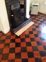 Black And Red Quarry Tile Floor With Rug Google Search Black Floor Tiles Black Floor Flooring Inspiration