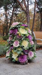 These beautiful flowers are perfect for the fall season and will be sure to add a depth of color to your flower garden. Autumn Garden Flower Tower Using Flowering Cabbages Plant Cabbage Flowerin