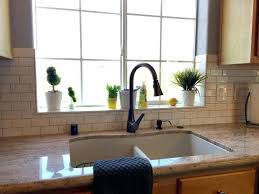 We also picked up some white bullnose tile for the ends that wouldn't terminate into a wall. Kitchen Window Sill Kitchen Sink Window Kitchen Renovation
