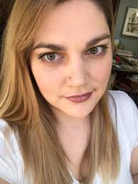 Cait cosplay photos with rainbow background