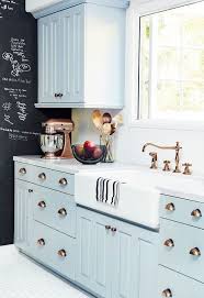 Tall cabinets are their own species—they can range from 84 to 96 inches tall, in general, and 12 to 24 inches deep. Baby Blue Kitchen Cabinets With Copper Hardware Accessories Kitchen Eclectic Farmhouse French Country Rustic By Cons Home Kitchens Kitchen Remodel Home Decor