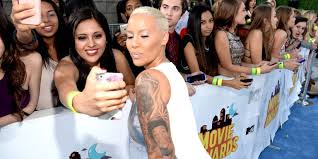 Wiz khalifa's tattoos for the stars who can out smoke him. See How Amber Rose Inked Over Her Tattoo Of Wiz Khalifa With Another Man S Face Lifestyle Bet