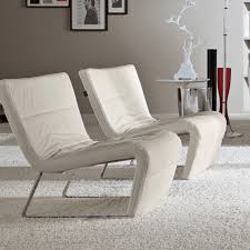 From the louis xiv to the monobloc. Roulette White Leather Designer Armchair