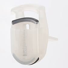 Silicon pad curls from base to tip and includes one replacement pad. Eyelash Curler Muji