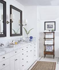 Master Bath British Colonial White Cabinet Dark Mirror Natural Elements Classic Bathroom Inspiration Guest Bathroom Small Bathroom Inspiration