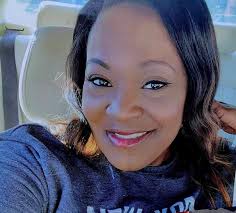 I am looking for someone to remove the shadow from my friends pic. This is  one of her favorite photos & this beautiful woman just lost her mom & I  feel a