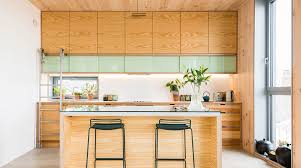 The cherry cabinets and island in this kitchen receive a fresh coat of paint in this renovation that cost fresh, white cabinets, new brass hardware, and some open shelving turned this kitchen into a gorgeous space. How To Choose The Right Kitchen Cabinet Materials For Your Project Architizer Journal