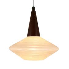 Highly sought after original and largely intact distinctive atomic age flying saucer style desk or table lamp designed and fabricated by or for the the sight light corp., deep river, conn. Flying Saucer Pendant Lamp Made Of Glass And Wood 1960s 1443