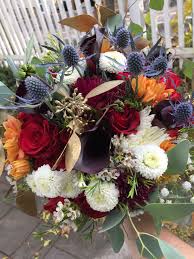 Black And Silver Wedding Bouquet My Wedding Bouquet By Petals On The Bus Hand Painted Gold Eucalyptus Seed Eucalyptus Red Roses Orange Blue Gold Wedding Wedding Bouquets Black Calla Lily